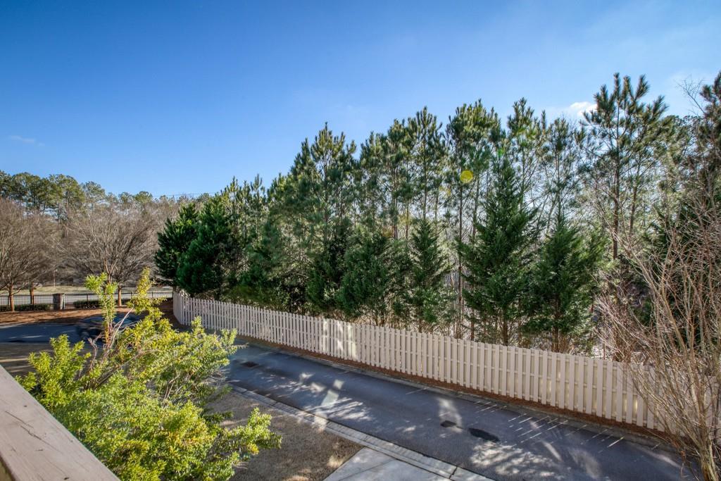2010 Heathermere Way Roswell, GA 30075 - Photo 39 of 42 a view of a garden with wooden fence