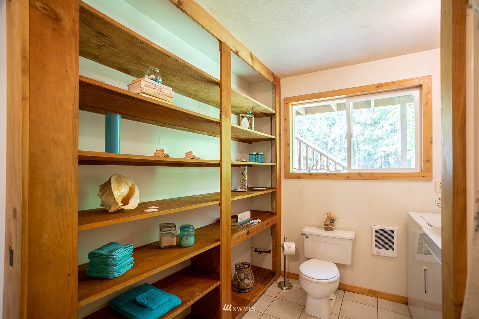 1407 Huntley Road Bellingham, WA 98226 - Photo 13 of 39 a bathroom with a toilet sink and mirror