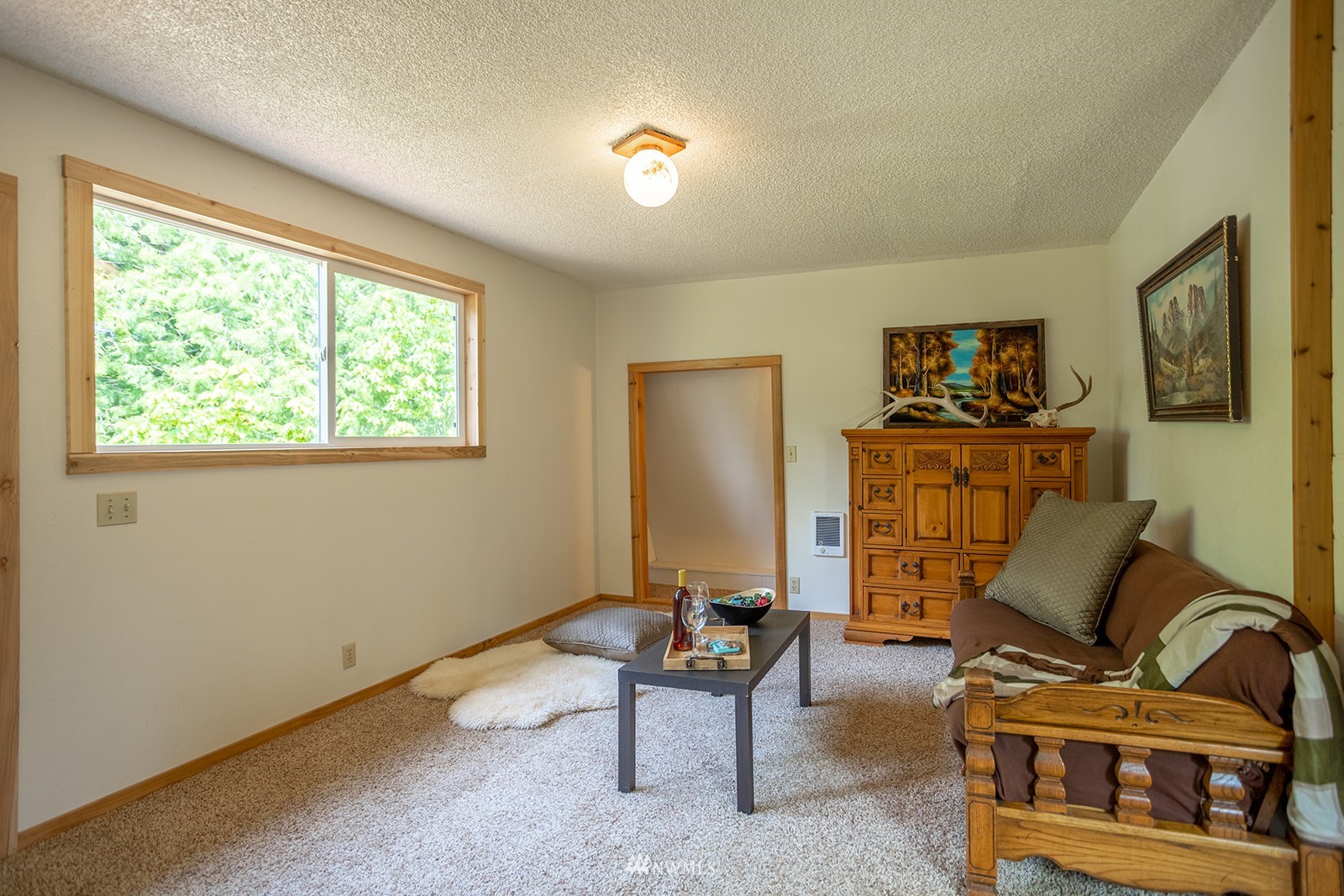1407 Huntley Road Bellingham, WA 98226 - Photo 16 of 39 a living room with furniture and a window