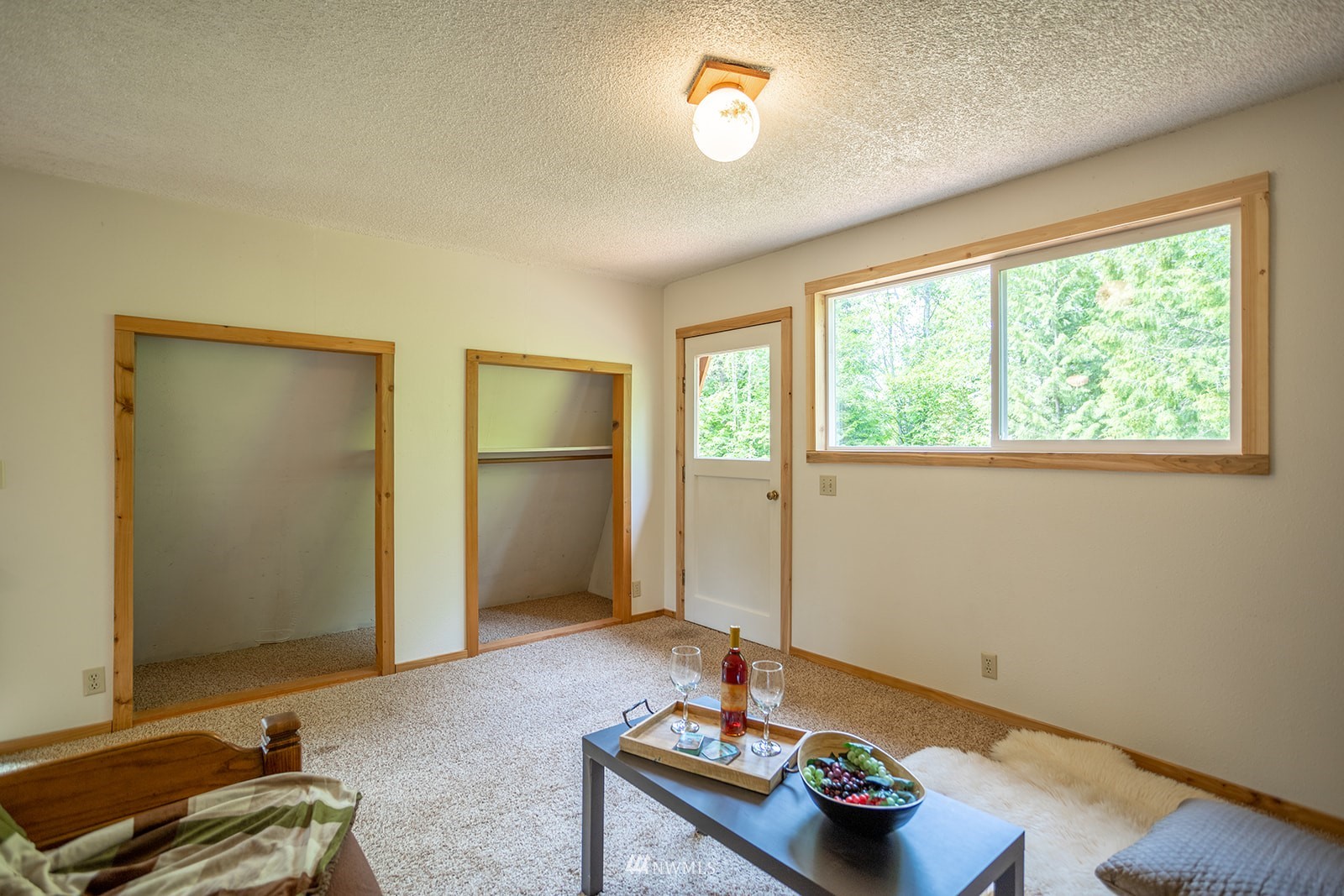 1407 Huntley Road Bellingham, WA 98226 - Photo 17 of 39 a living room with furniture and a window