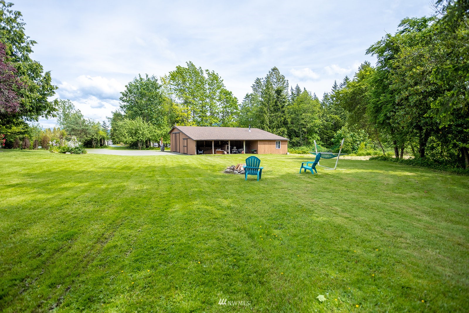 1407 Huntley Road Bellingham, WA 98226 - Photo 28 of 39 a view of a house with a backyard