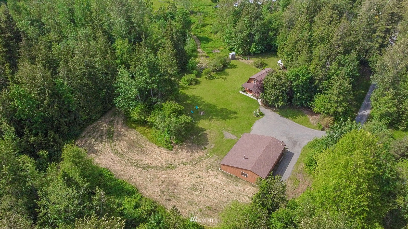 1407 Huntley Road Bellingham, WA 98226 - Photo 37 of 39 an aerial view of a house with a yard