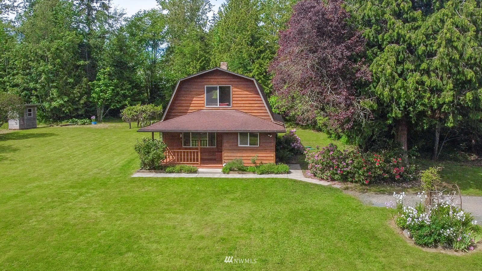 1407 Huntley Road Bellingham, WA 98226 - Photo 5 of 39 a front view of a house with a yard