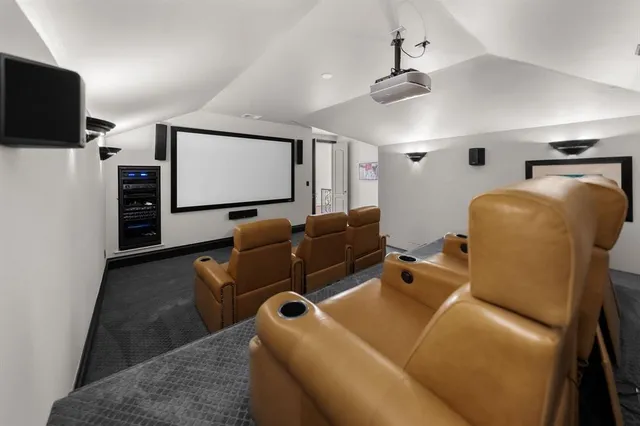 a room with furniture and a flat screen tv