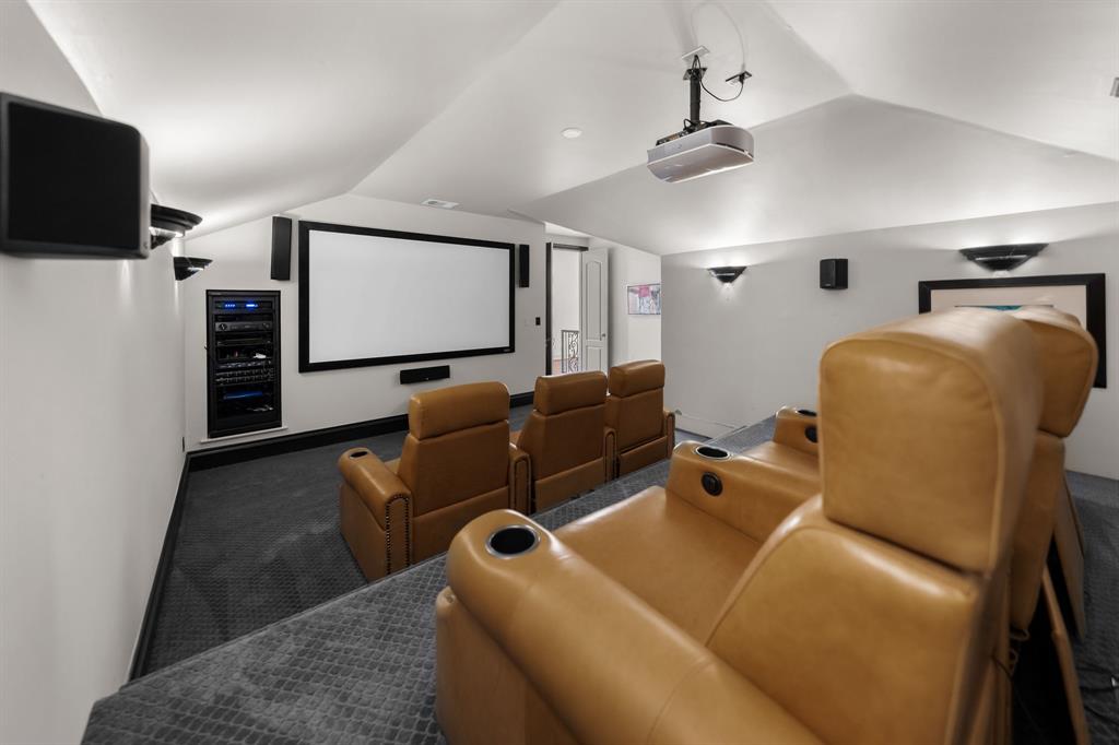 401 Brooks Hollow Road Lakeway, TX 78734 - Photo 28 of 40 a room with furniture and a flat screen tv