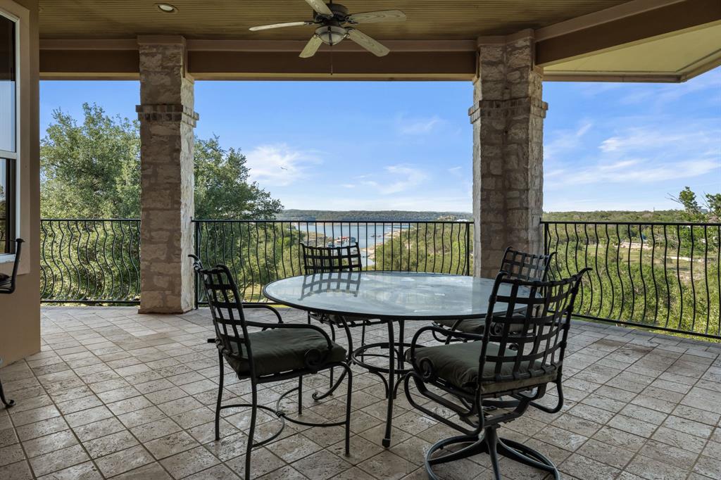 401 Brooks Hollow Road Lakeway, TX 78734 - Photo 32 of 40 a view of a balcony with furniture