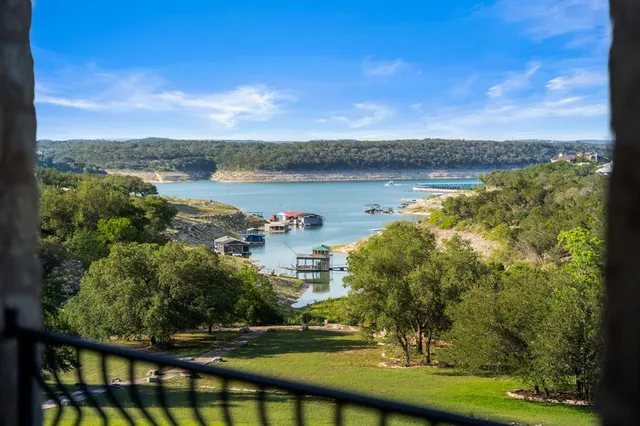 a view of a lake with a big yard