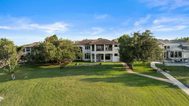 a view of a house with a big yard
