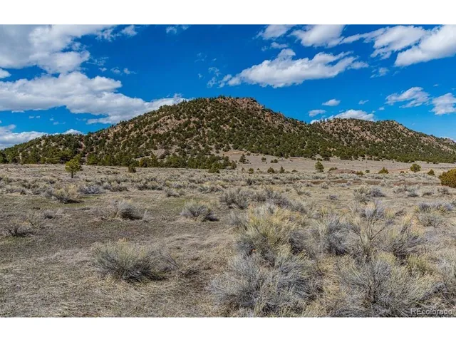a view of a backyard of a house
