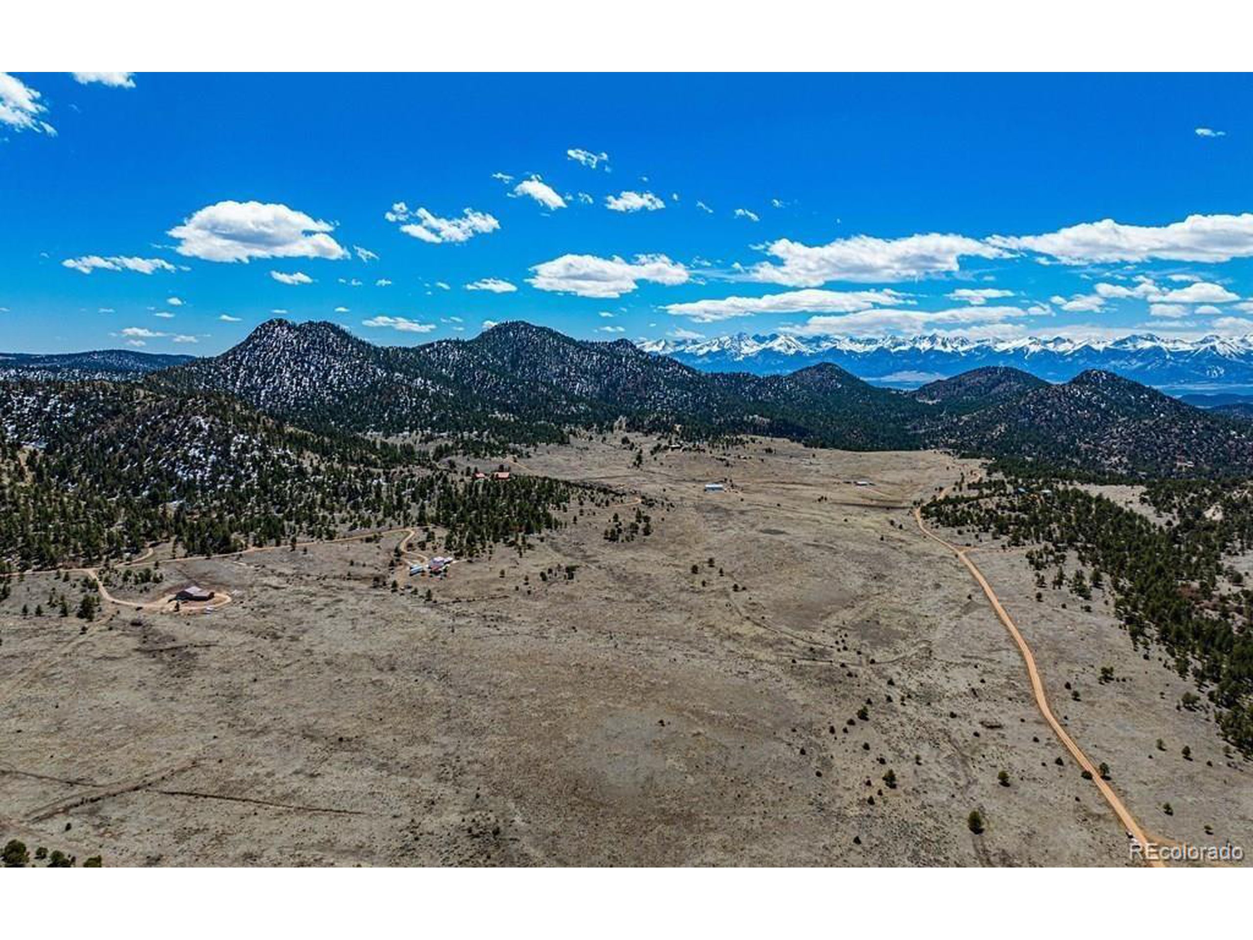 36 Marcey Road Westcliffe, CO 81252 - Photo 2 of 25 a view of a lake with a beach