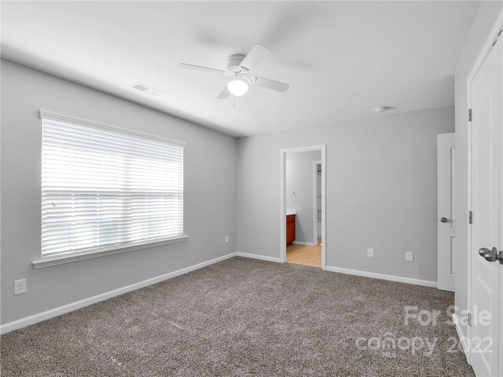 10502 Ebbets Road Charlotte, NC 28273 - Photo 30 of 48 a view of an empty room with a window