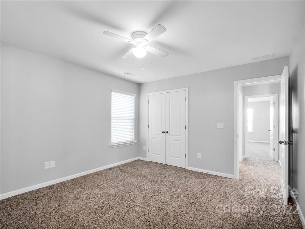 10502 Ebbets Road Charlotte, NC 28273 - Photo 32 of 48 a view of an empty room with a window