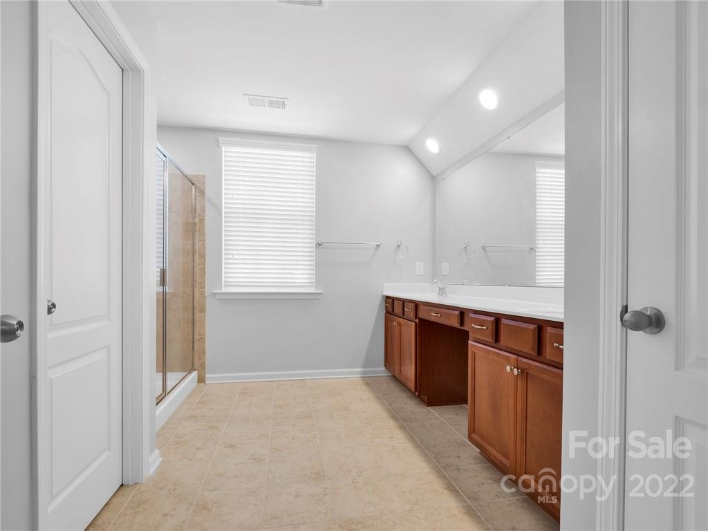 10502 Ebbets Road Charlotte, NC 28273 - Photo 38 of 48 a room with window and cabinets