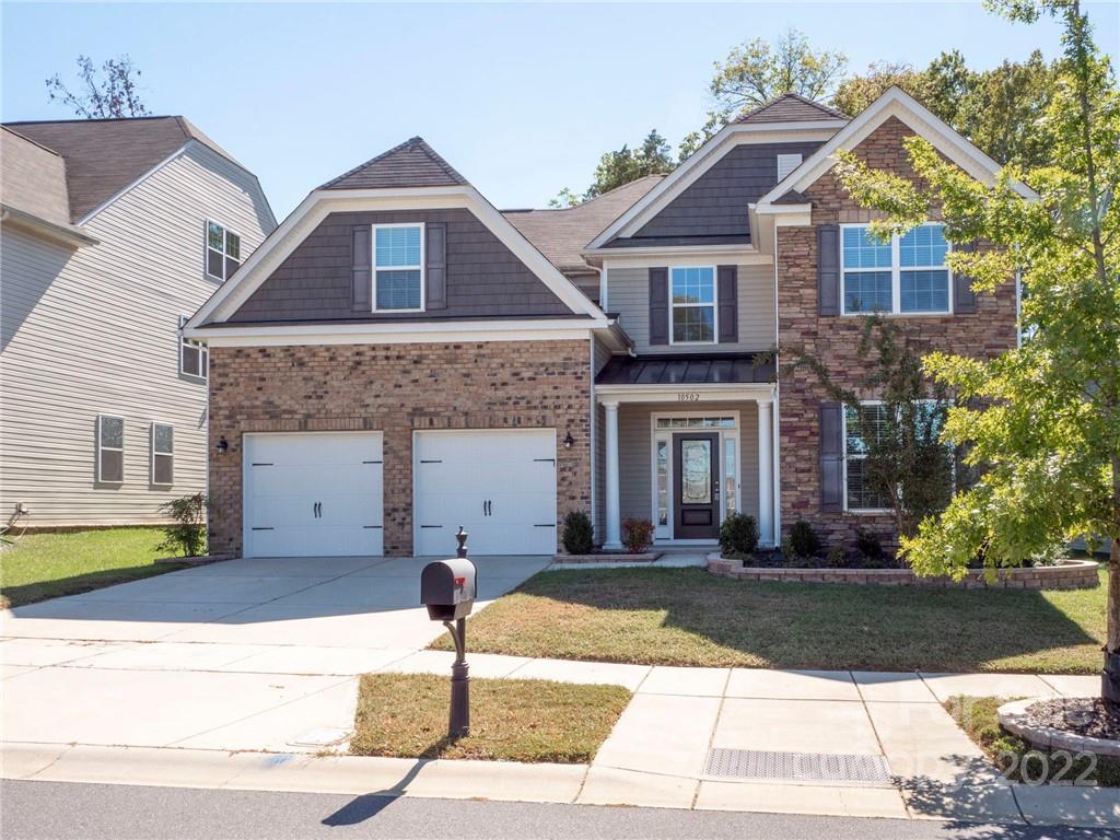 10502 Ebbets Road Charlotte, NC 28273 - Photo 45 of 48 a front view of a house with yard