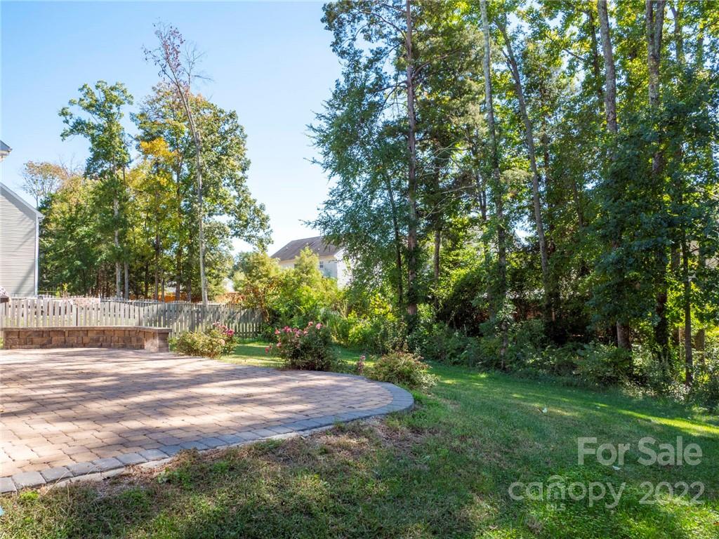10502 Ebbets Road Charlotte, NC 28273 - Photo 47 of 48 a view of backyard with tree