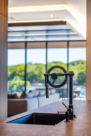 a view of balcony with wooden floor and lake view