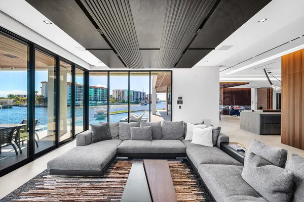 a view of a swimming pool with seating space