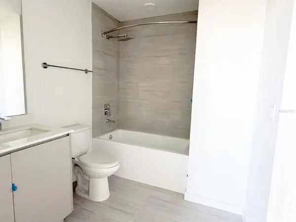 a bathroom with a bath tub