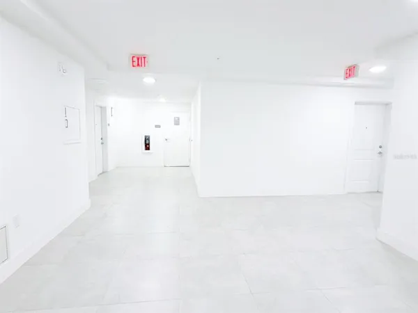 a view of hallway with a window