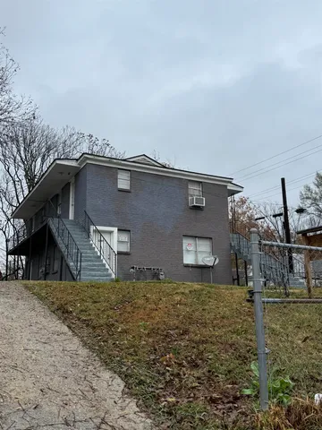 a house view with a outdoor space