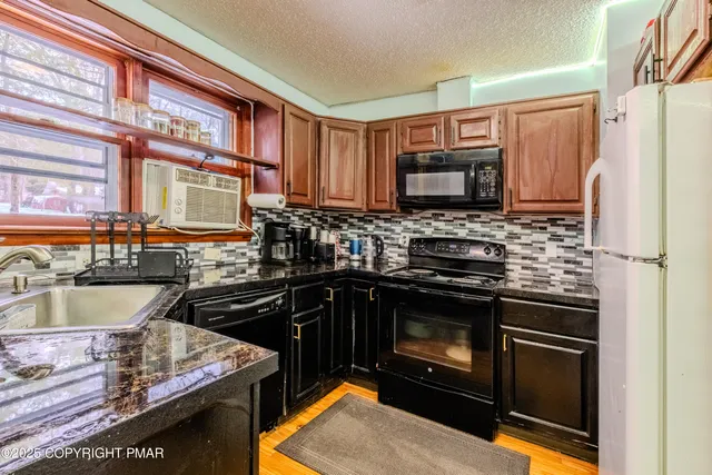 a kitchen with a stove and a sink