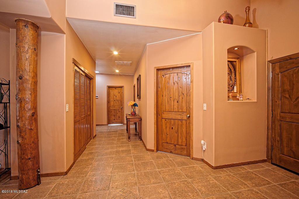 1721 Camino Jalisco Rio Rico, AZ 85648 - Photo 24 of 39 a view of a hallway with a glass door