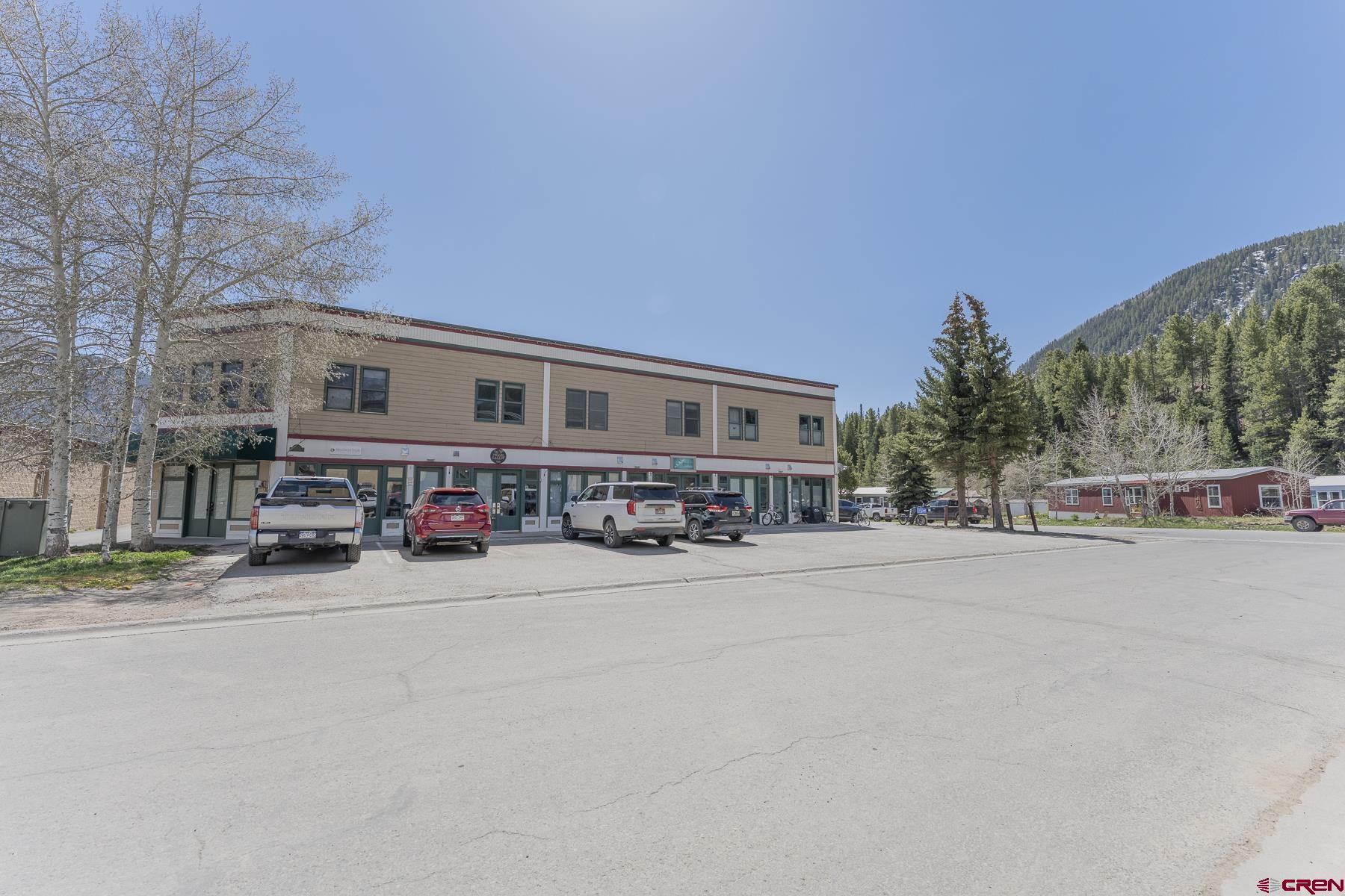 503 Red Lady Avenue, Unit 103 Crested Butte, CO 81224 - Photo 31 of 34 a car parked in front of a building