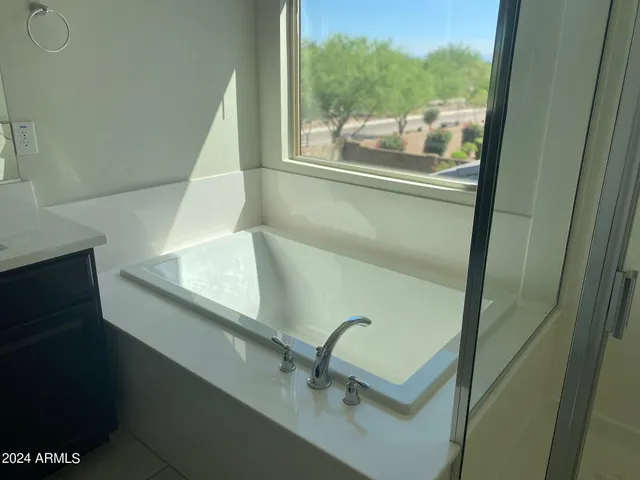 an empty room with wooden floor