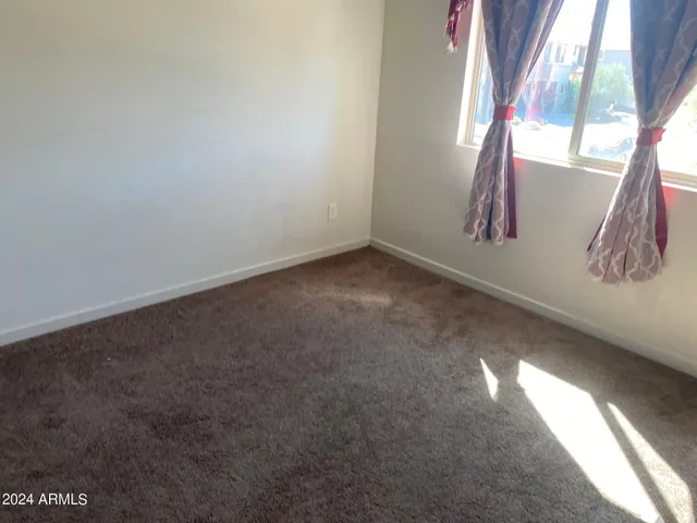 a view of a backyard with a garden and plants