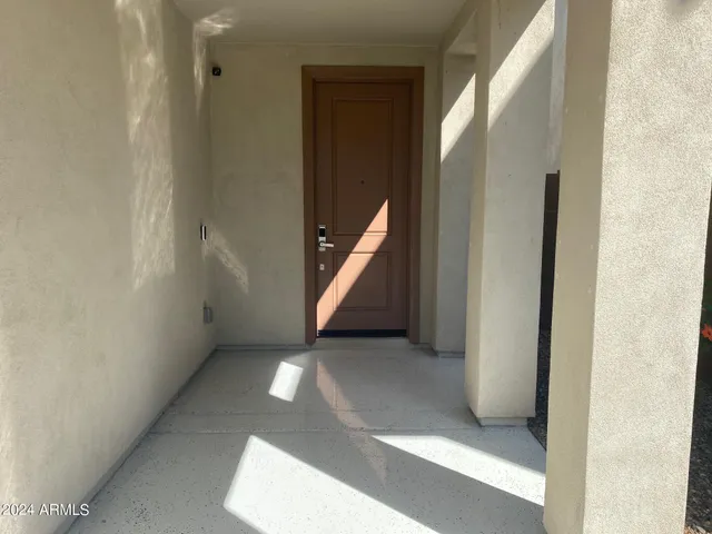 a view of a hallway with entryway