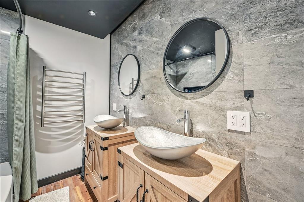 965 Rutledge Road Transfer, PA 16154 - Photo 26 of 50 Dual sinks, tiled walls, heated towel rack & ample outlets