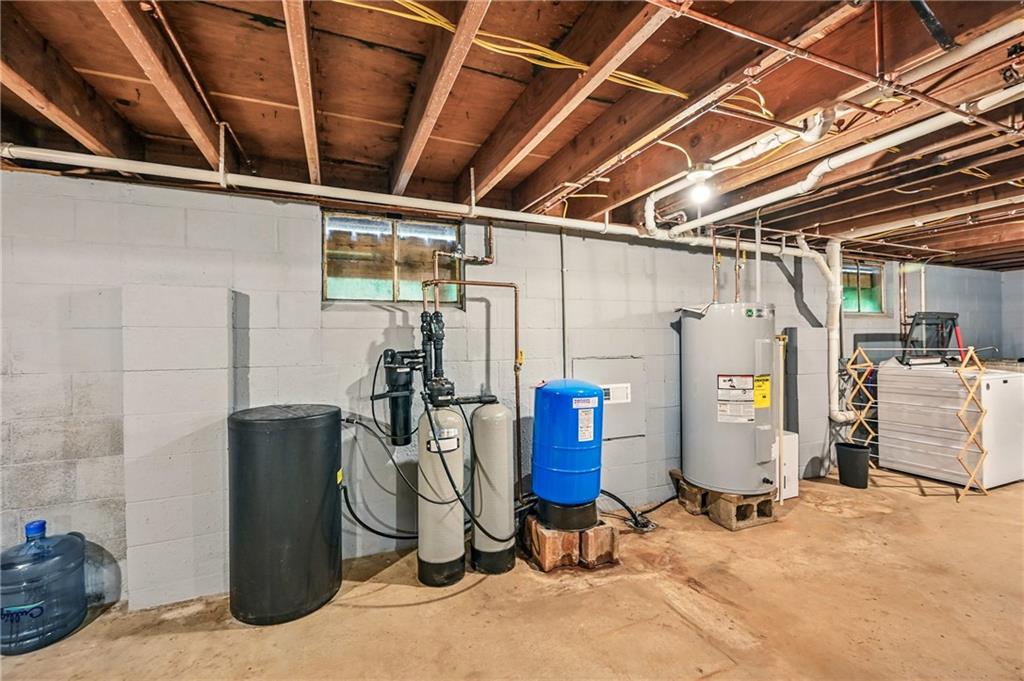 965 Rutledge Road Transfer, PA 16154 - Photo 41 of 50 Well pump, water softener & hot water tank