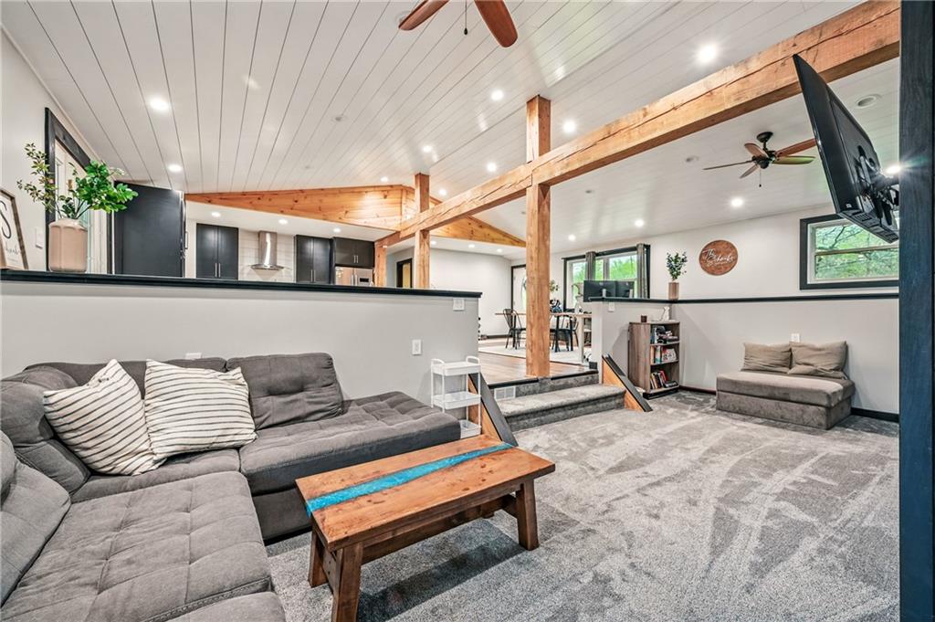 965 Rutledge Road Transfer, PA 16154 - Photo 8 of 50 Sunken living room with wood beam features for character, newer amenities through out