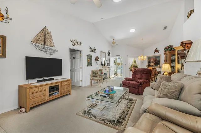 a bathroom with a granite countertop sink a mirror and a shower