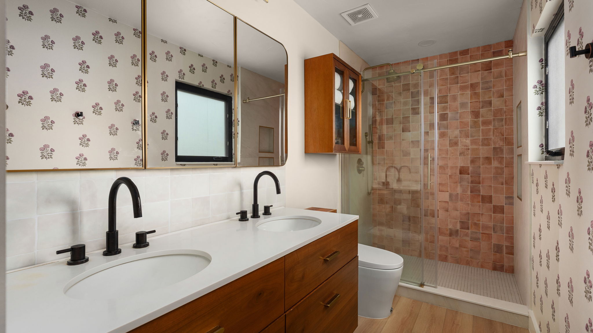 404 Whitetail Drive Manchaca, TX 78652 - Photo 17 of 33 Bathroom with double vanity, a shower stall, and light wood-style floors