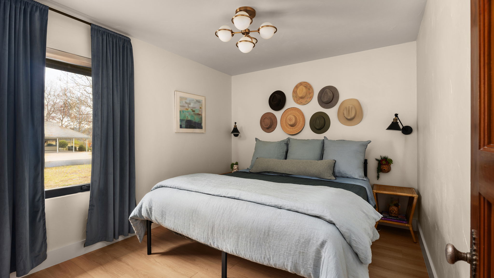 404 Whitetail Drive Manchaca, TX 78652 - Photo 19 of 33 Bedroom with light wood-style flooring and baseboards