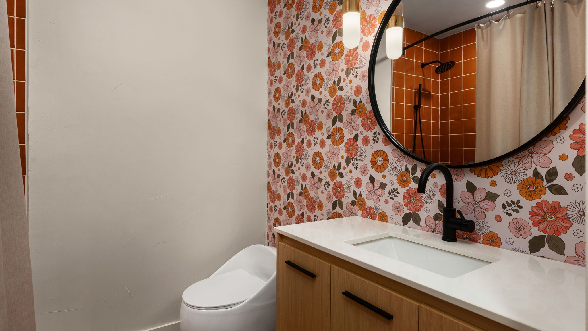 404 Whitetail Drive Manchaca, TX 78652 - Photo 20 of 33 Bathroom featuring vanity, a shower with shower curtain, and wallpapered walls
