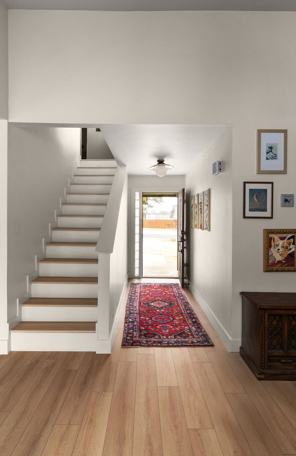 404 Whitetail Drive Manchaca, TX 78652 - Photo 26 of 33 Foyer entrance with stairway and wood finished floors