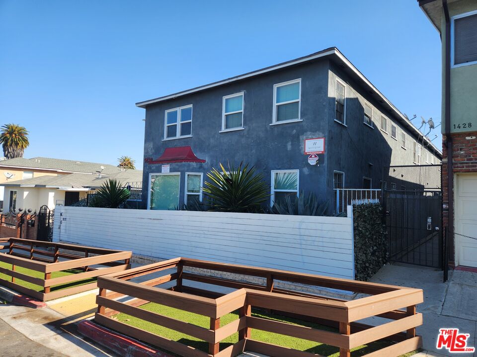 1430 Chestnut Avenue Long Beach, CA 90813 - Photo 11 of 11 a roof deck with a potted plant and wooden floor