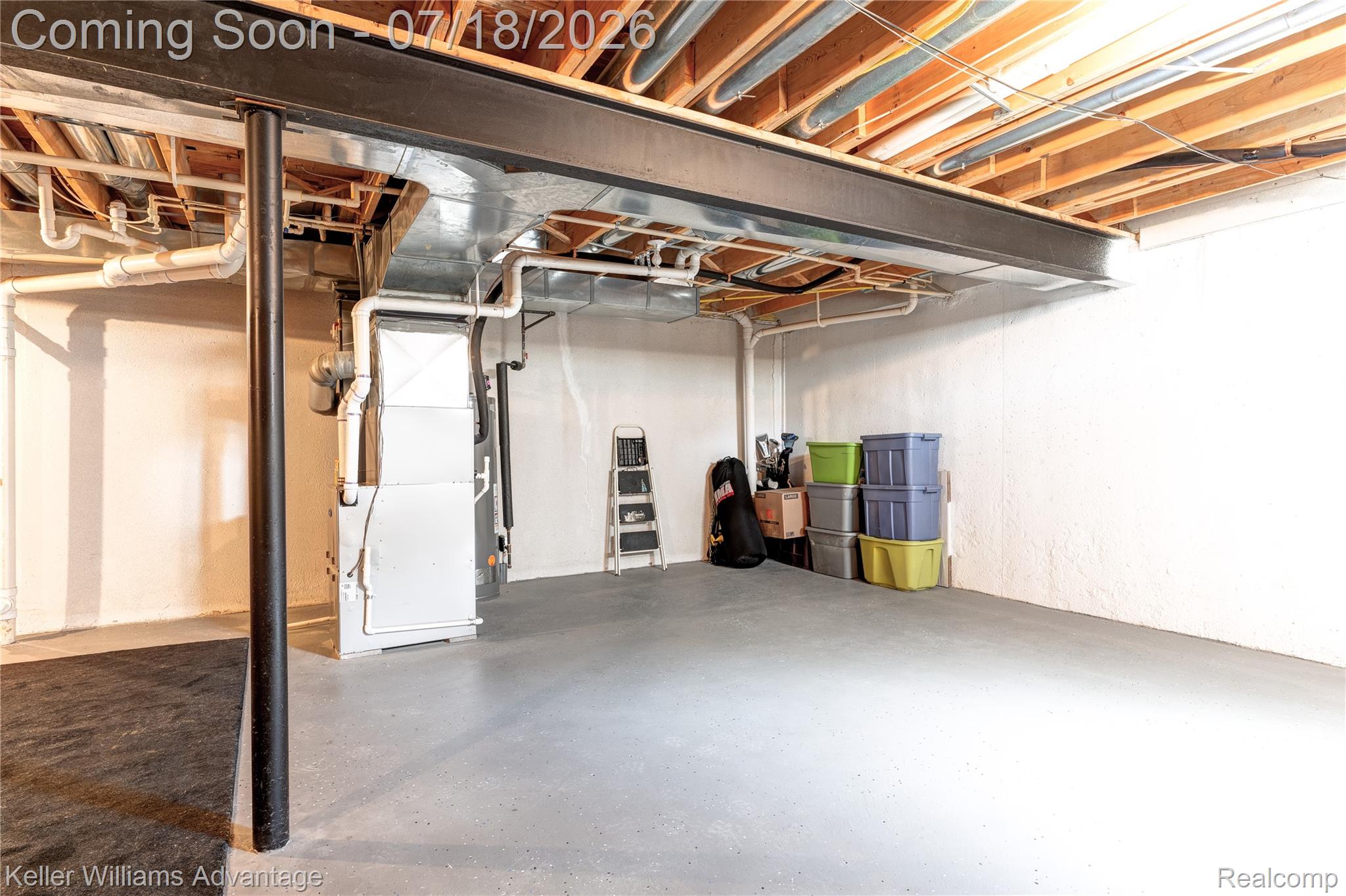 41647 Mitchell Road Novi, MI 48377 - Photo 39 of 43 Basement space featuring a white painted foundation wall, concrete flooring, exposed ceiling joists, and a visible HVAC system