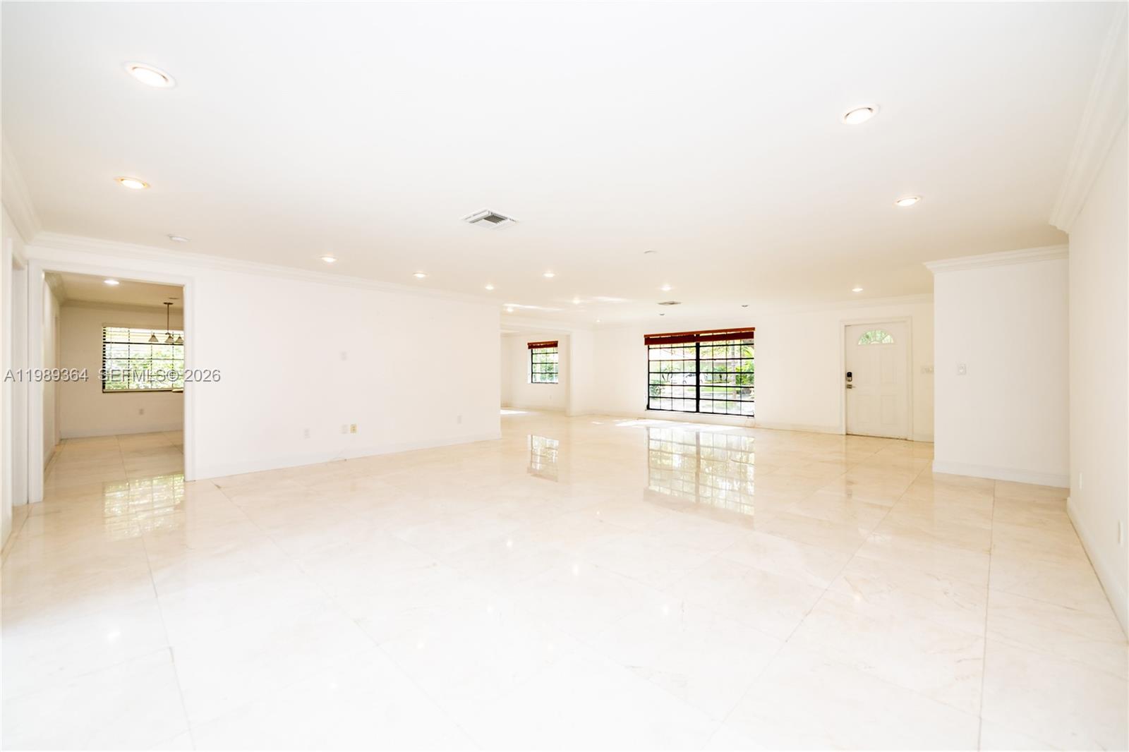 4160 Bay Point Road Miami, FL 33137 - Photo 13 of 60 a view of an empty room with a window
