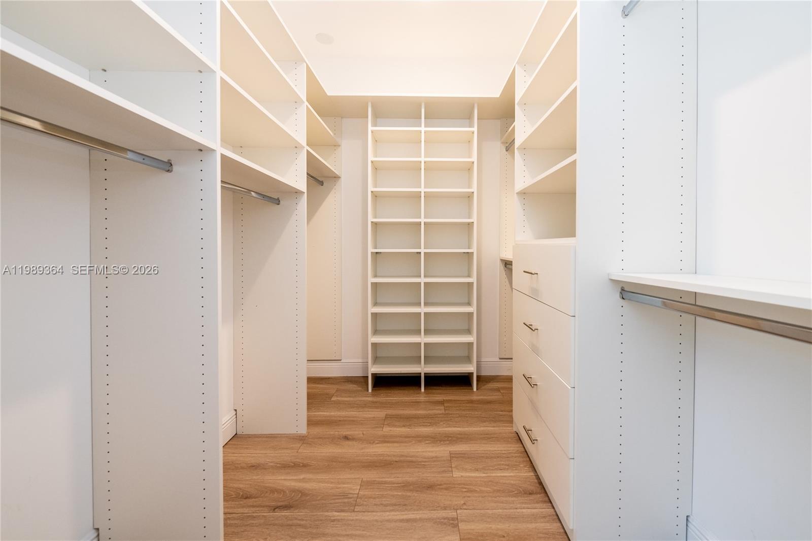 4160 Bay Point Road Miami, FL 33137 - Photo 37 of 60 a view of closet area with empty racks