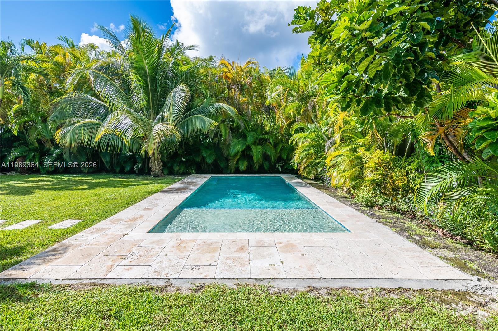 4160 Bay Point Road Miami, FL 33137 - Photo 56 of 60 a view of a swimming pool with an outdoor space