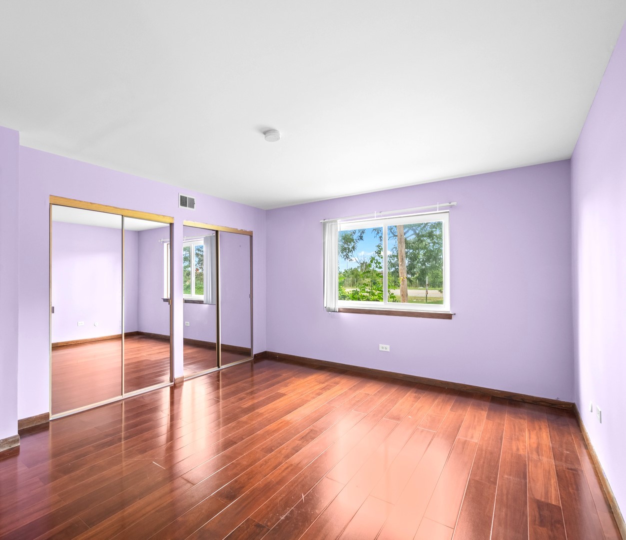 1472 Carol Court, Unit 1A Palatine, IL 60074 - Photo 2 of 11 an empty room with window