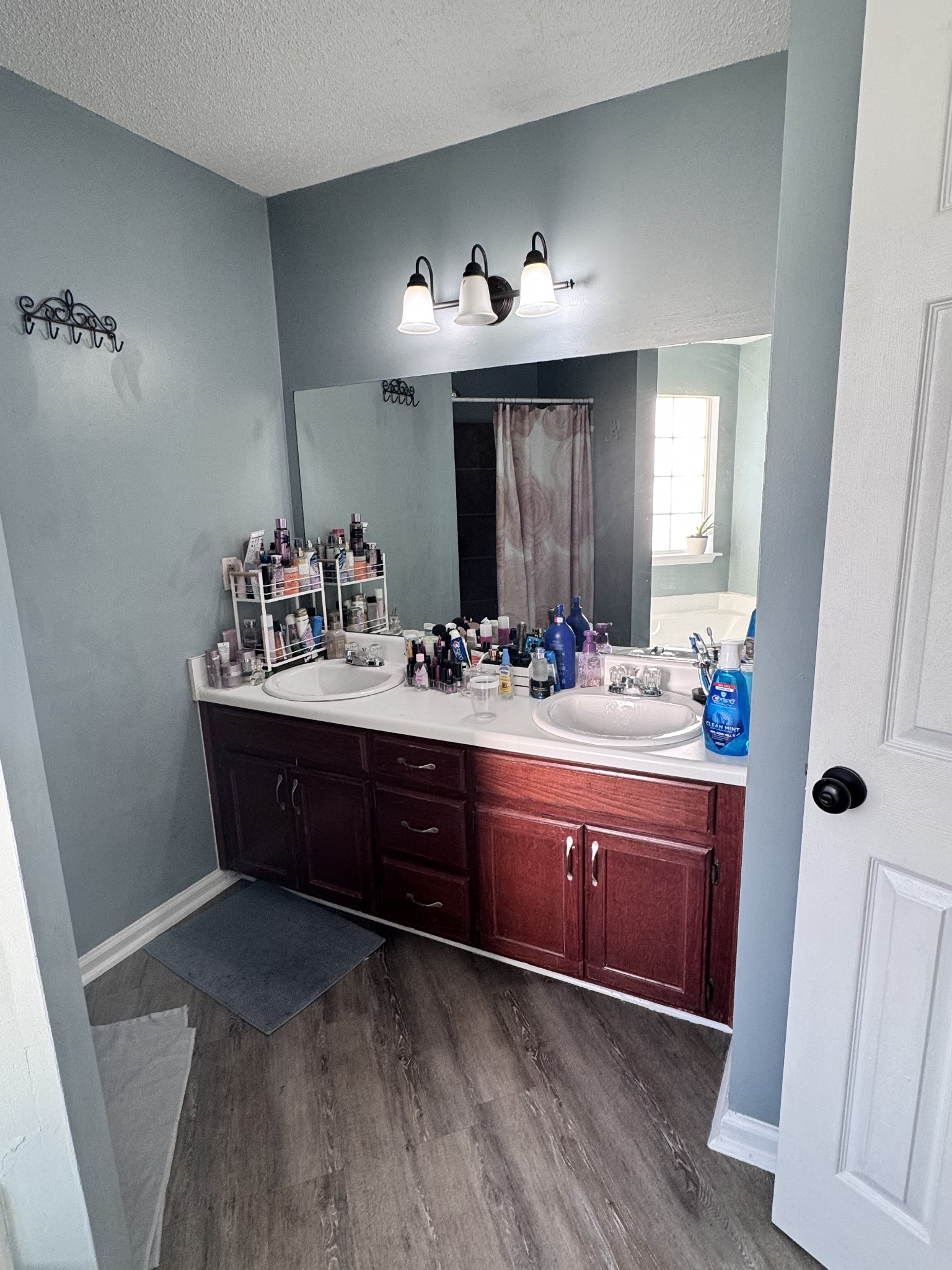 589 Hollandale Road La Vergne, TN 37086 - Photo 13 of 27 a spacious bathroom with double vanity and a mirror