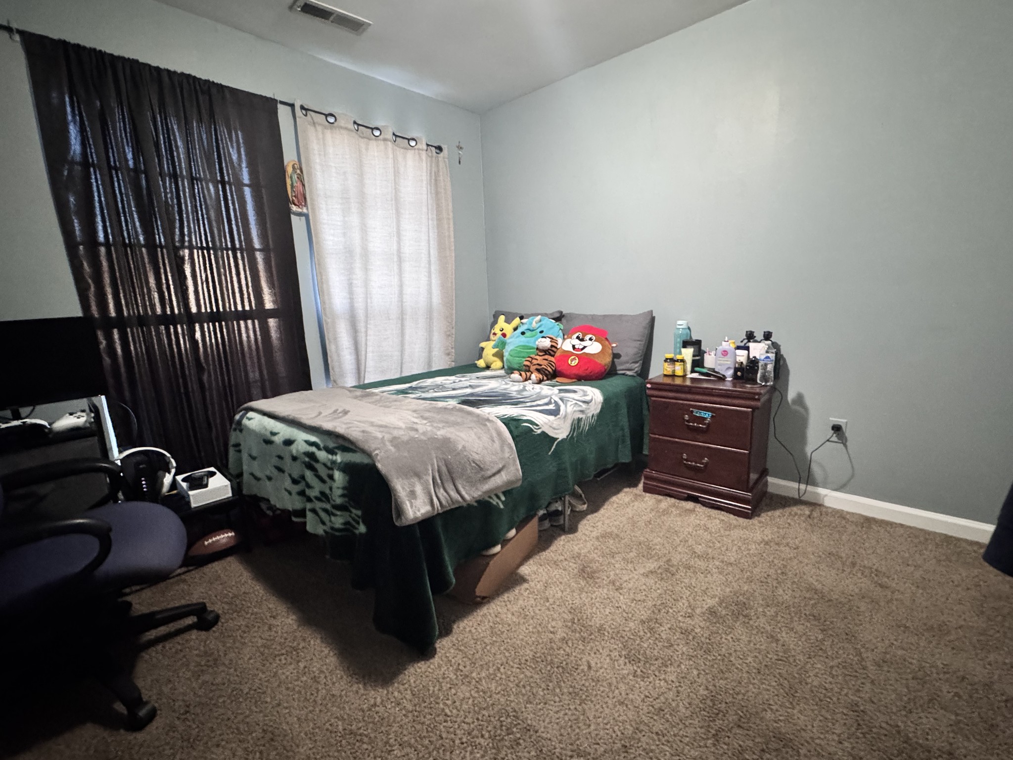 589 Hollandale Road La Vergne, TN 37086 - Photo 19 of 27 a bedroom with a bed and a window