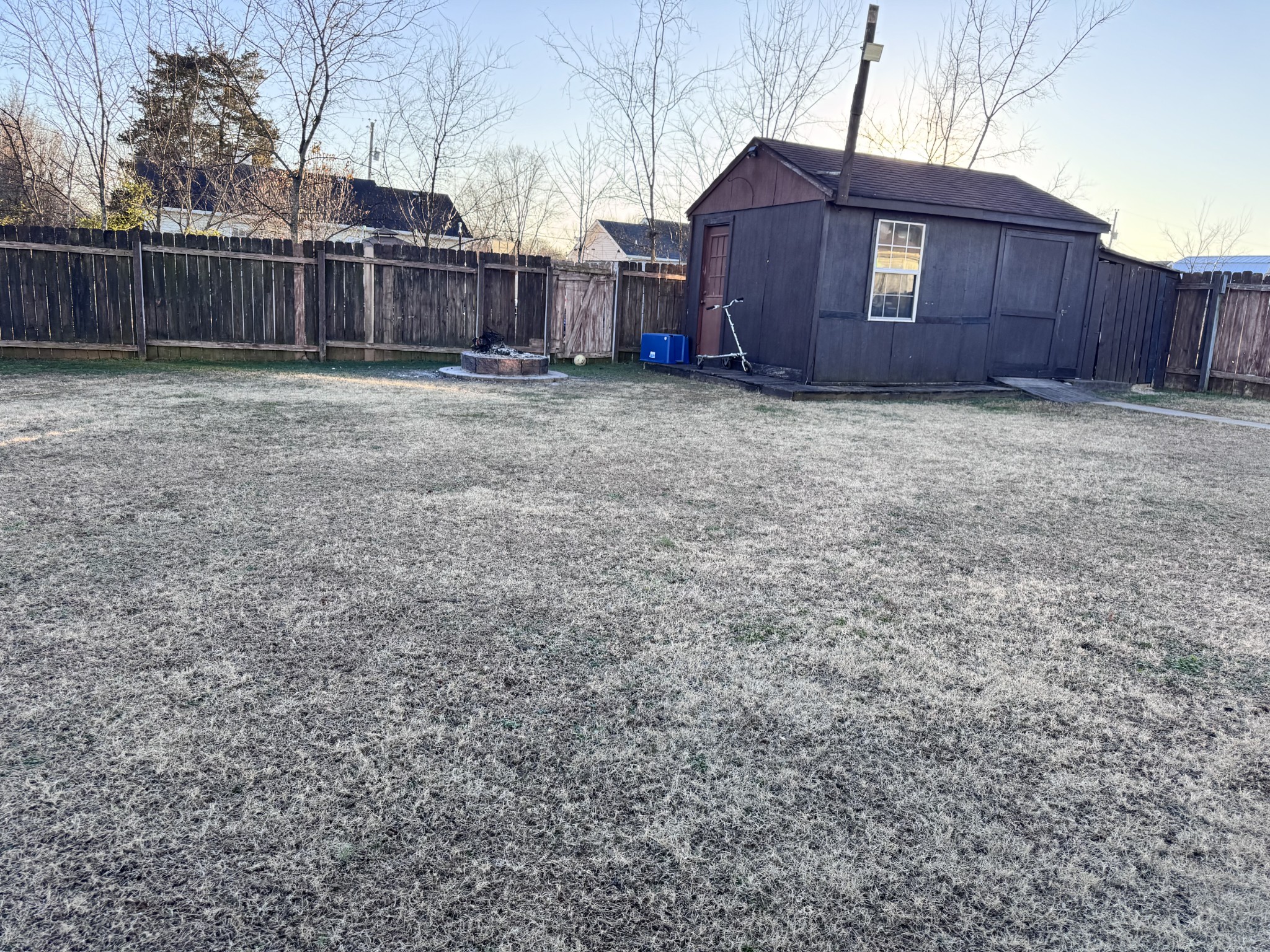 589 Hollandale Road La Vergne, TN 37086 - Photo 22 of 27 a view of a small yard with wooden fence