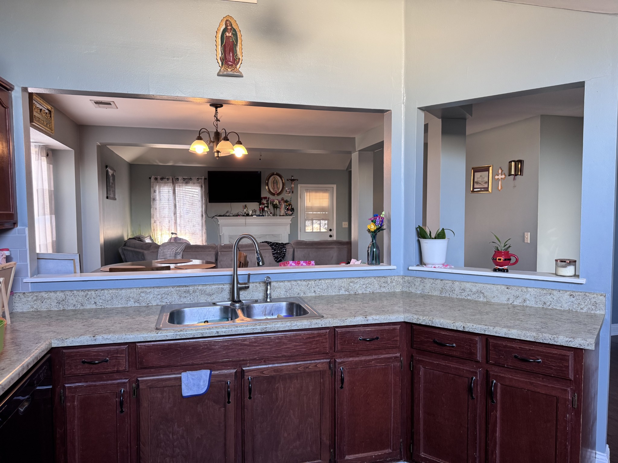 589 Hollandale Road La Vergne, TN 37086 - Photo 3 of 27 a sink with a granite countertop sink and a mirror