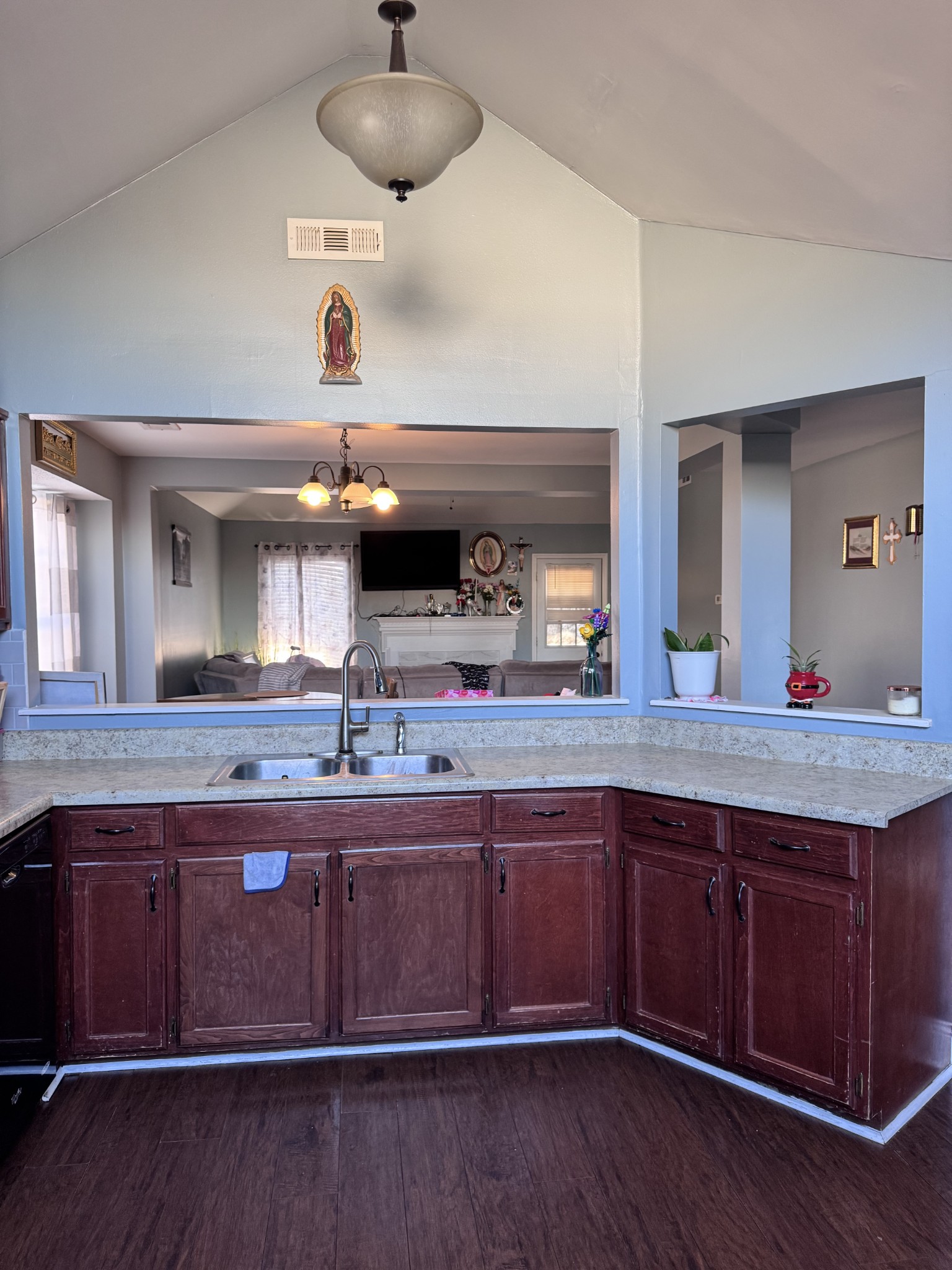 589 Hollandale Road La Vergne, TN 37086 - Photo 4 of 27 a view of kitchen with stainless steel appliances a sink and wooden floor