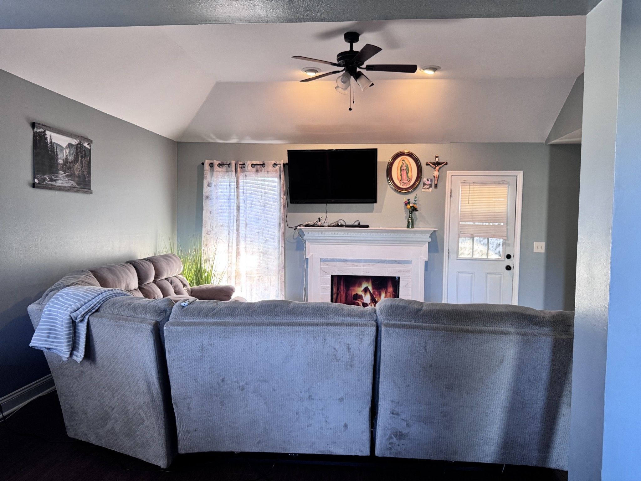 589 Hollandale Road La Vergne, TN 37086 - Photo 7 of 27 a living room with furniture and a fireplace